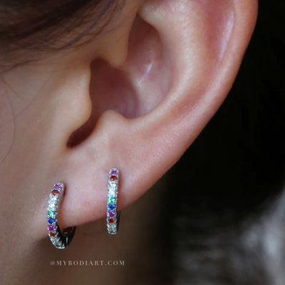 Cute Multiple Ear Piercing Ideas for Teens Feminine Rainbow Small Huggie Hoop Earring Studs with Colorful Crystals  - lindo arco iris piercing oreja ideas para mujeres - www.MyBodiArt.com
