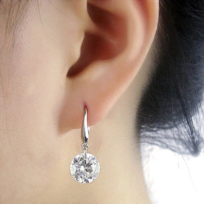 Fancy Classy Ear Piercing Ideas for Women - Crystal Drop Dangle Silver Earrings - elegantes pendientes de cristal - www.MyBodiArt.com #earrings