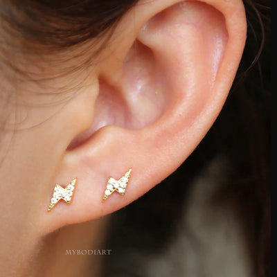 Cute Dainty Crystal Lightning Bolt Earring Studs in Gold or Silver for Women Classy Ear Piercing Jewelry Ideas for Women - www.MyBodiArt.com 