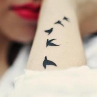 Cute Small Flying Bird Sparrow Silhouette Wrist Arm Tattoo Ideas for Women - tatuaje de la muñeca pequeña silueta de pájaro volador  - www.MyBodiArt.com