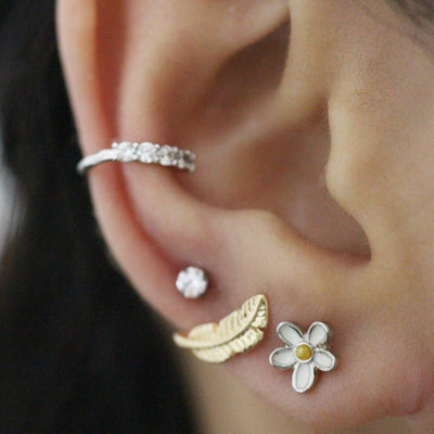 Multiple Ear Piercing Jewelry Ideas for Women - Cute Daisy Enamel Earring Stud for Cartilage, Helix, Tragus, Conch - www.MyBodiArt.com #piercing #earpiercing #cartilage #helix #tragus 