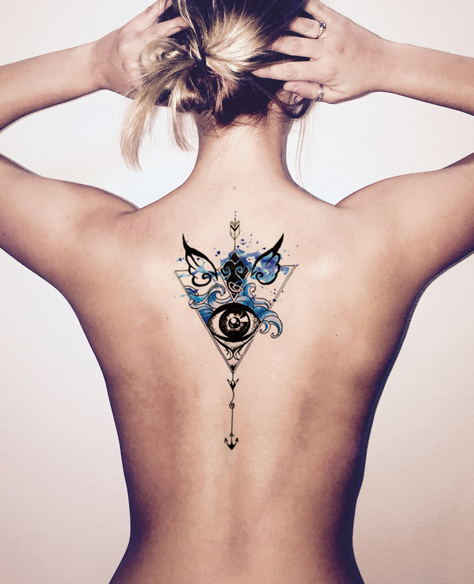 Evil Eye Tattoo on Lower Back