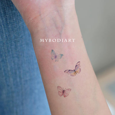 Trending Cute Small Watercolor Butterfly Wrist Tattoo Ideas for Females - www.MyBodiArt.com #tattoos