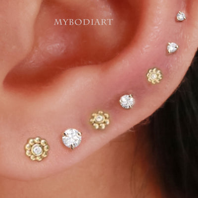 Multiple All The Way Around Cartilage Helix Ear Piercing Jewelry Ideas for Women - www.MyBodiArt.com