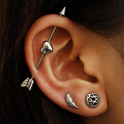 Cool Ear Piercing Ideas - Industrial Barbell - Heart Arrow Scaffold Bar - Double Leaf Earring Lobe Studs - www.MyBodiArt.com