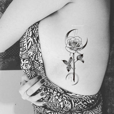 Beautiful Moon Crescent Rose Floral Flower Rib Tattoo Ideas for Women - www.MyBodiArt.com