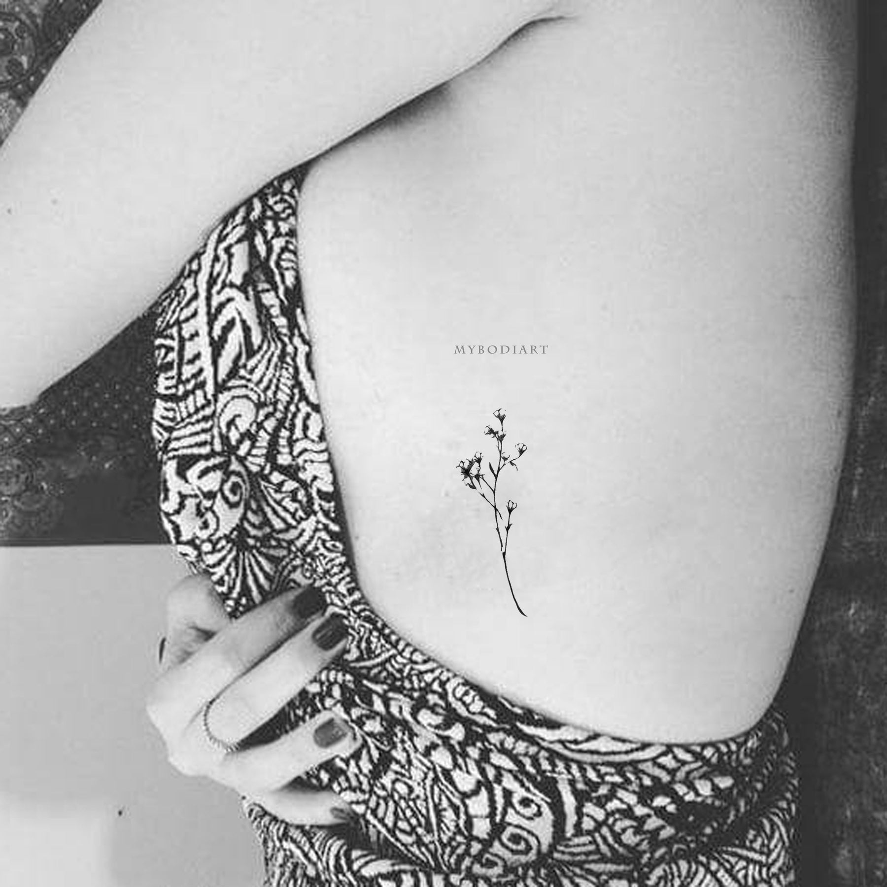 Wildflowers Tattoo | Wildflower tattoo, Simple arm tattoos, Elbow tattoos