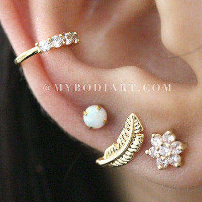 Creative Ear Piercing Combinations Ideas for Teen Girls - Pretty Opal Gold Earring Studs 16G - bonitas ideas de perforación de orejas de oro para chicas adolescentes - www.MyBodiArt.com #earrings 