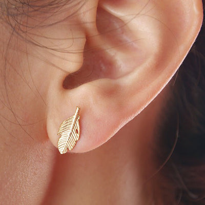 Simple Delicate Ear Piercing Ideas for Women - Minimalist Leaf Feather Earring Studs in Gold or Silver - ideas simples de piercing en la oreja - www.MyBodiArt.com #earrings 