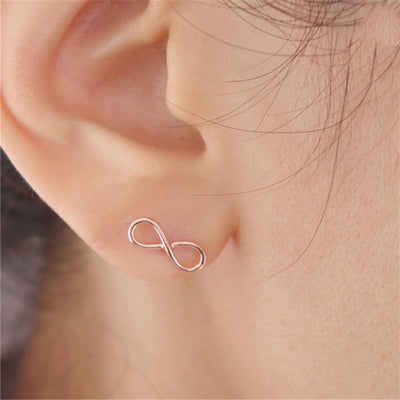 Delicate Minimalist Ear Piercing Ideas for Teens - Small Tiny Infinity Stud Earrings in Rose Gold or Silver - wwwMyBodiArt.com #earrings