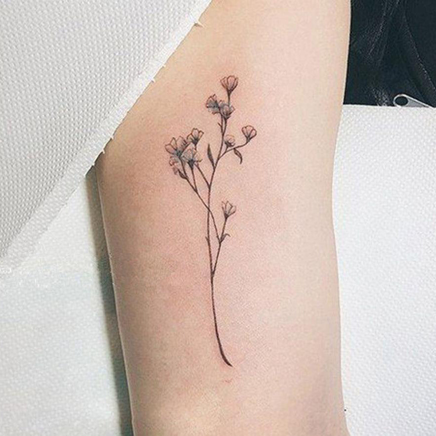 Small Flower Tattoo with Words as Stem