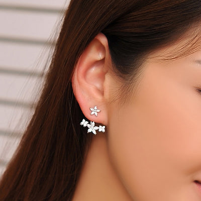 Cute Pretty Ear Piercing Ideas for Teens - Crystal Flower Ear Jacket Earring - www.MyBodiArt.com #earrings