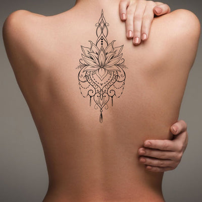 Bohemian Lotus Back Tattoo Ideas for Women - Feminine Tribal Flower Chandelier Jewelry Spine Tat - Ideas de tatuaje de espalda de mujer -  www.MyBodiArt.con #tattoo