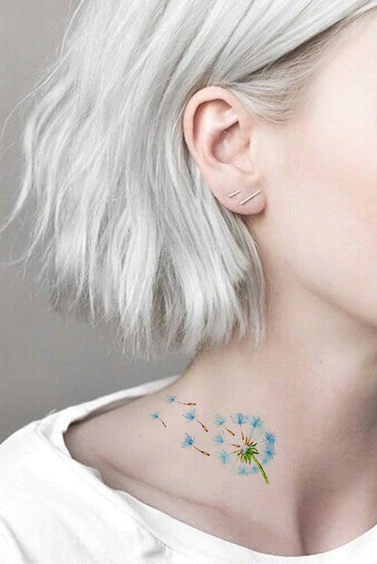 A Delicate Small Flower Neck Tattoo for Female Enthusiasts