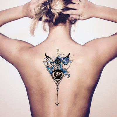 Watercolor Arrow Back Tattoo Ideas for Women - Black Henna Tribal Blue Angel Wings Evil Eye Tattoos at MyBodiArt.com 