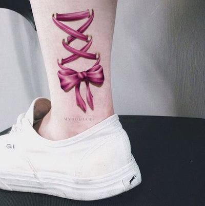Cute Pink Watercolor Criss Cross Bow Tie Ankle Temporary Tattoo Ideas for Women - www.MyBodiArt.com