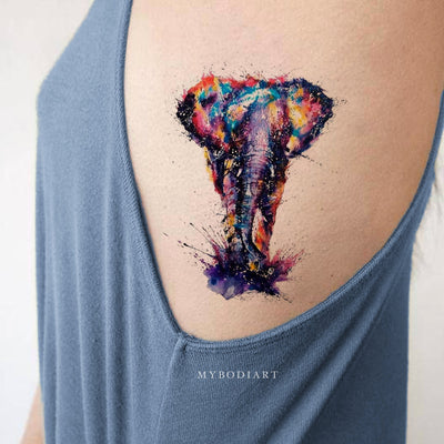 Beautiful Tattoo Design Art Watercolor Colorful Elephant Rib Tattoo Ideas for Women -  ideas de tatuaje de costilla de elefante - www.MyBodiArt.com #tattoos